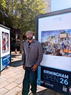Photo of Bach Singh standing in front of his artwork